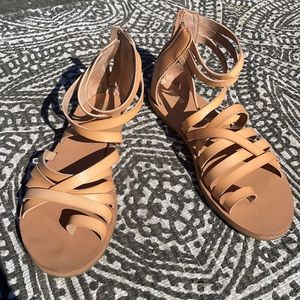 Tan strapped sandals!